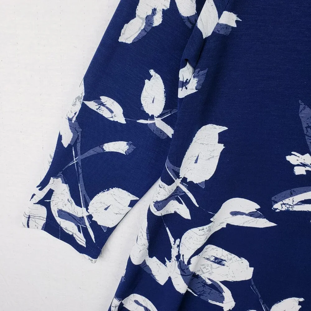 Clara Sun Woo USA Tunic Top Stretch Floral Print Sharkbite Hem size M Relaxed
